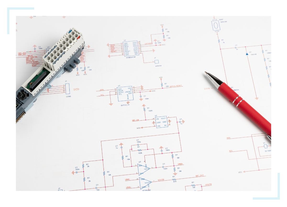 A schematic design with blue and red lines and symbols shows the blueprint and first step in turnkey electronic manufacturing